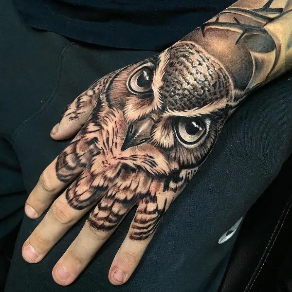 owl tattoo on the hand