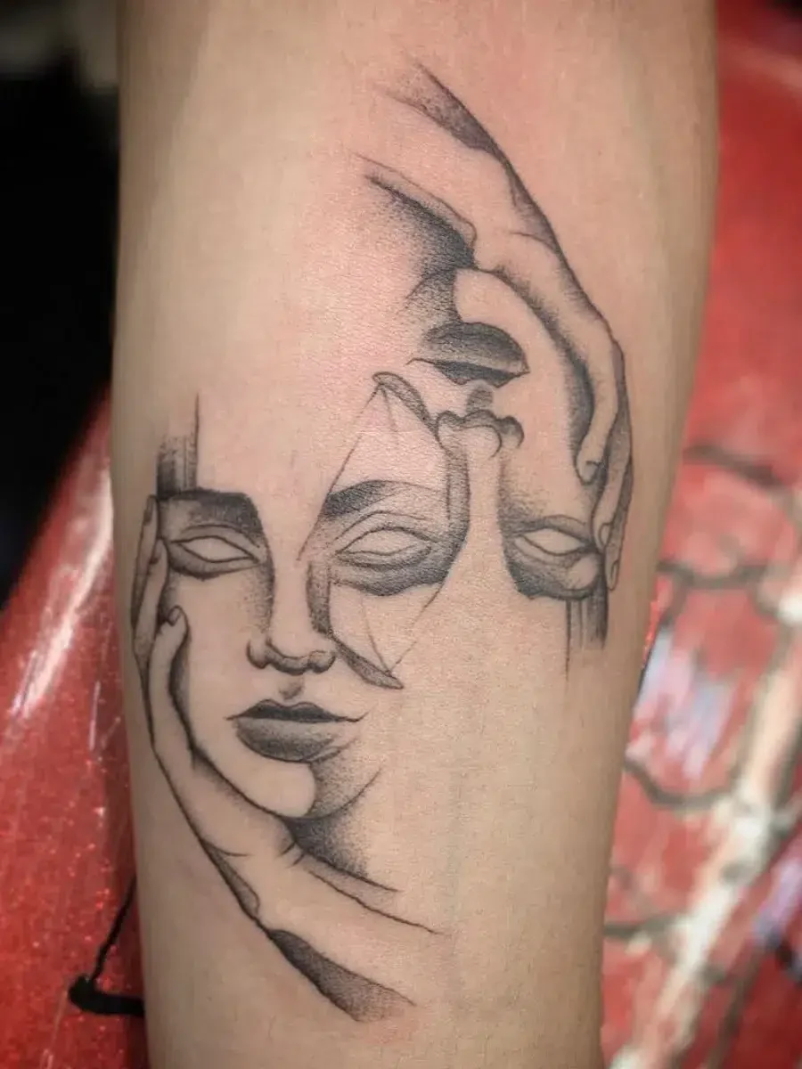 Geometric abstract face tattoo